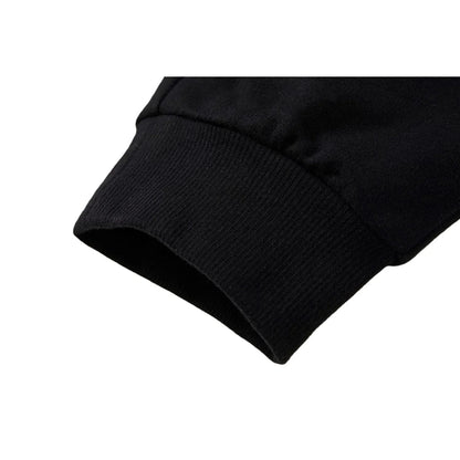Close-up of the tapered leg and ribbed ankle cuffs on Ogender cotton joggers.