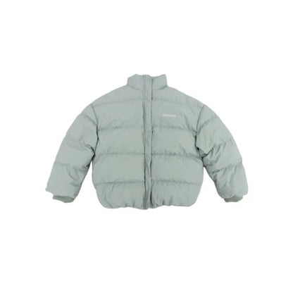 Front view of the junior unisex oversized puffer jacket in Avocado Green.