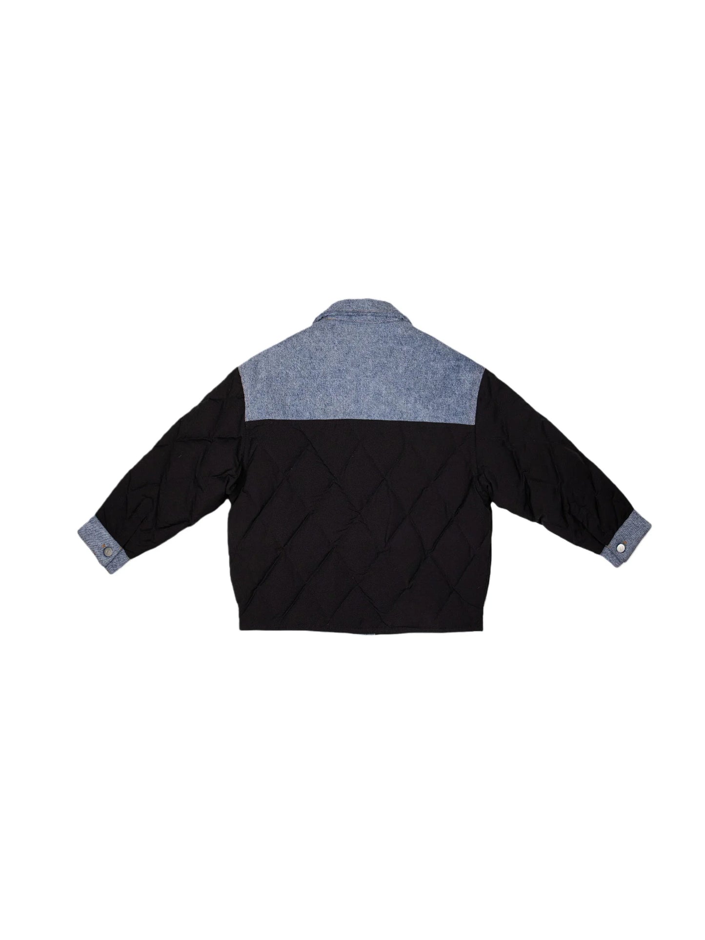 Back view of the junior black puffer jacket featuring a denim yoke and diamond quilting.