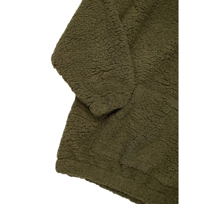 Detailed view of the reinforced cuffs and spacious kangaroo pocket on the junior army green Sherpa fleece.