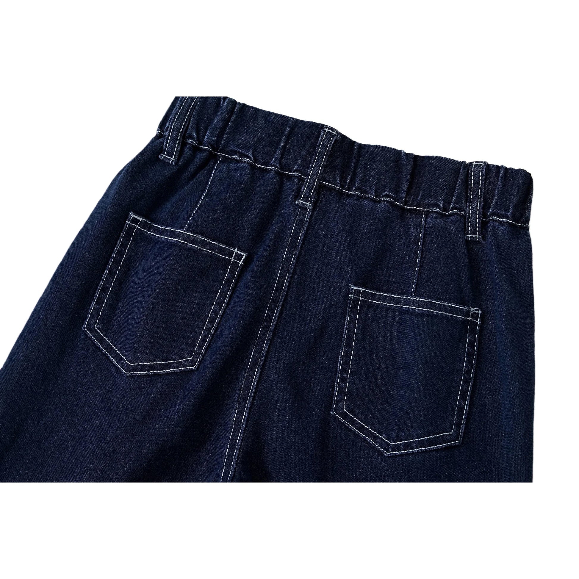 Detailed view of the rear patch pockets and elasticated waistband on Ogender indigo soft-touch denim.