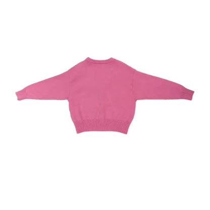 Back view of the minimalist pink knit cardigan, showing the clean, relaxed silhouette