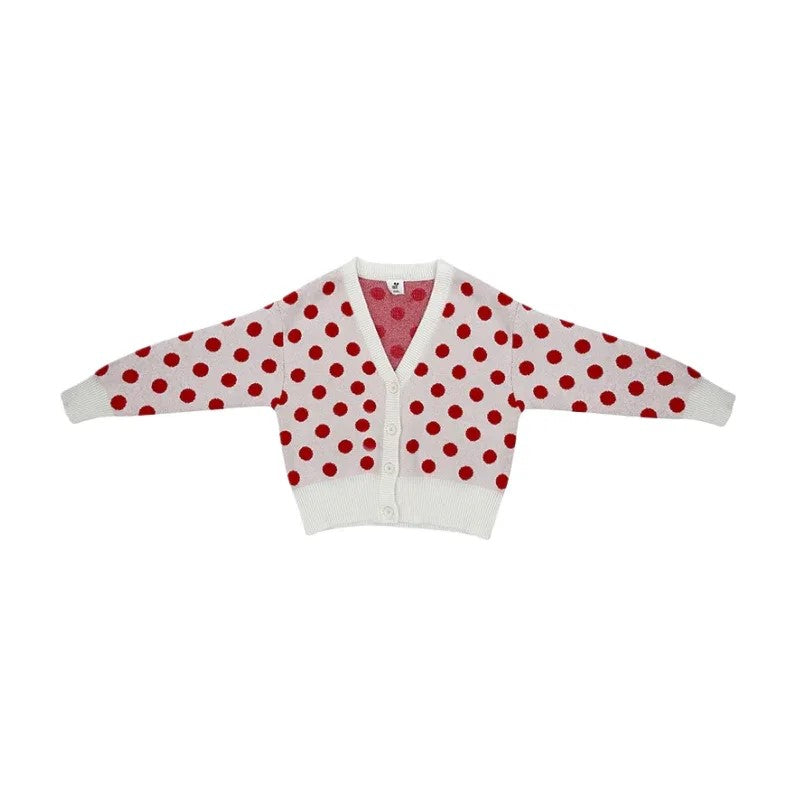 Front view of Ogender kids white knit cardigan with bold red polka dots.