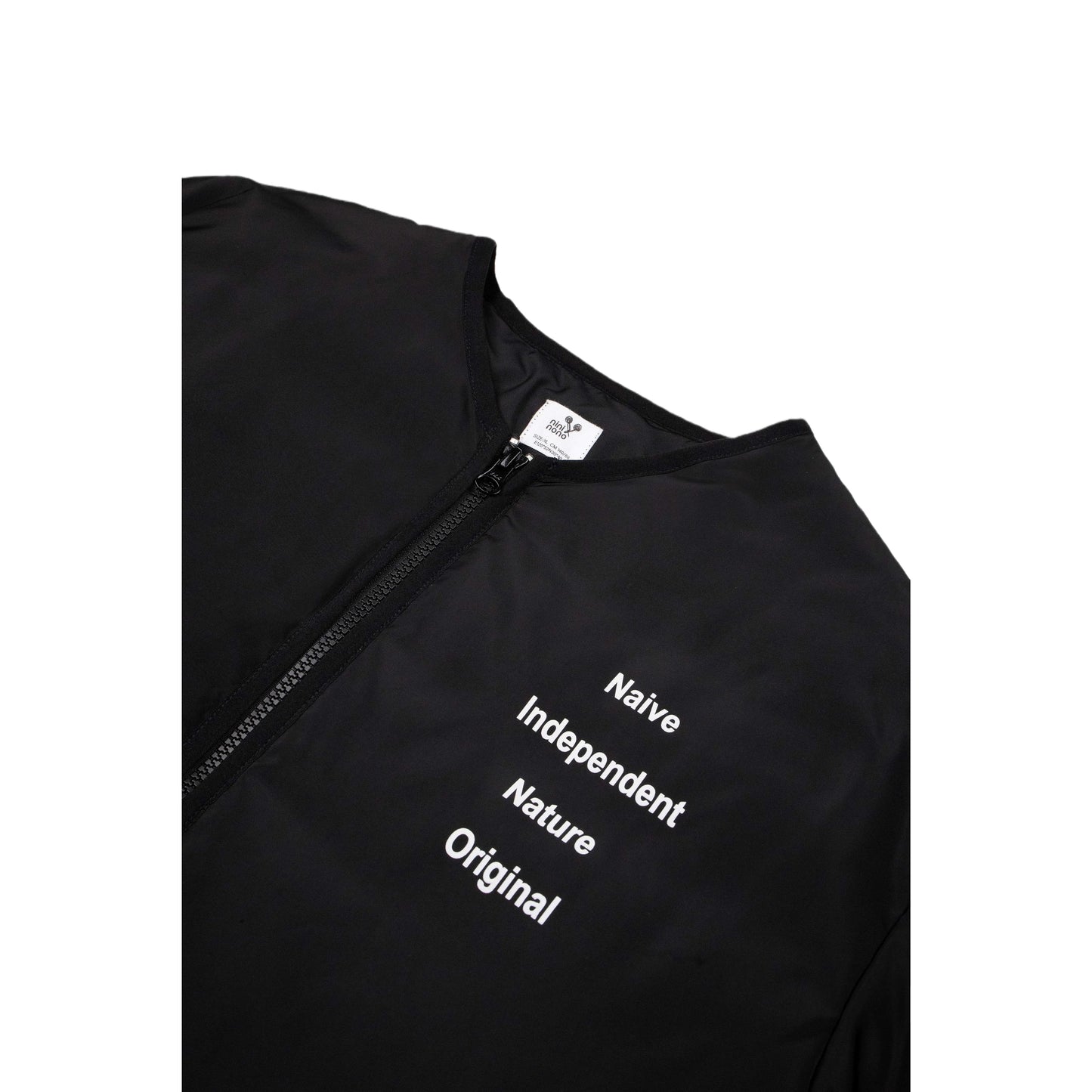 Close-up of the industrial-style white typography on the chest of the black jacket.