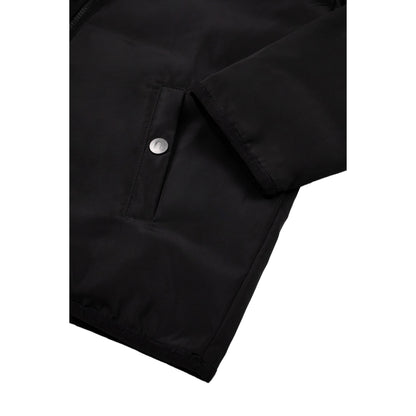 Close-up of the functional side pocket with a secure metal snap closure.