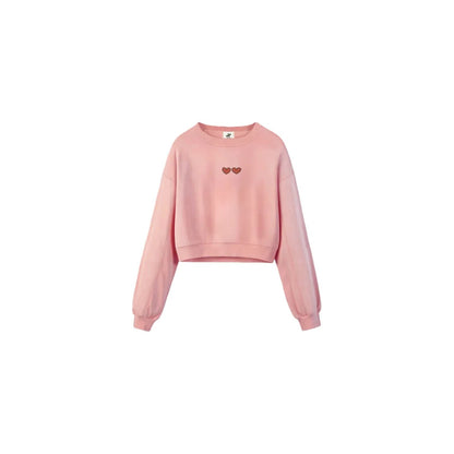 Front flat lay of the Ogender pink cropped sweatshirt featuring the minimalist heart print on the chest.