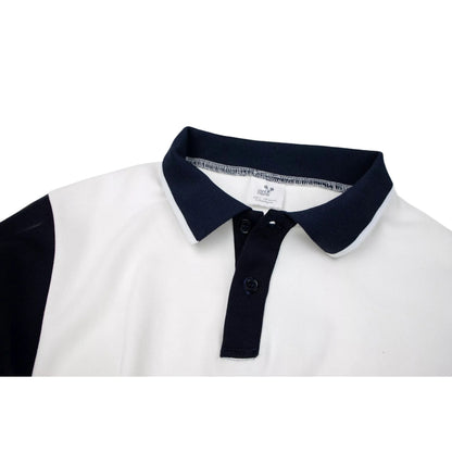 Close-up of the dark navy polo collar and button placket with white stitching.