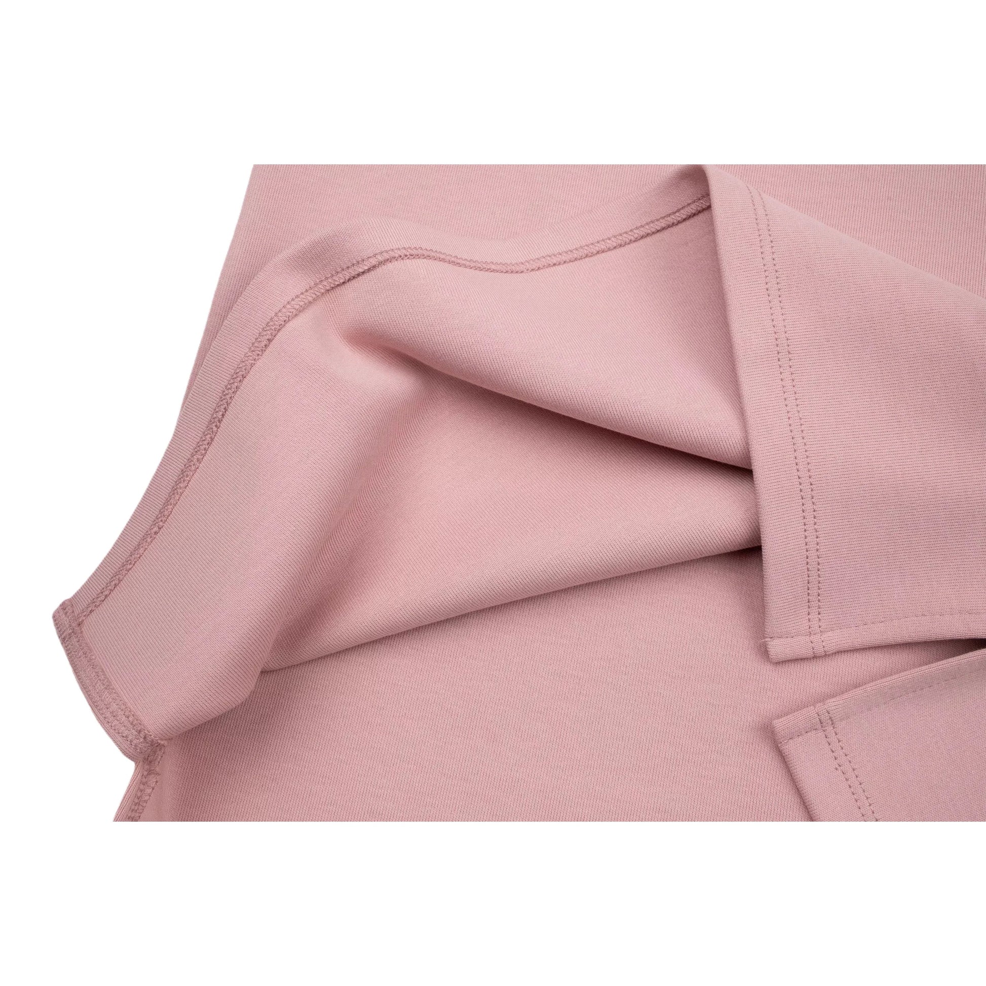 Close-up of the dress hem flipped over, showcasing the clean interior stitching and the premium 340 GSM fabric texture.