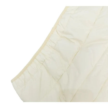 Detailed shot of the soft elastic binding at the hem for a snug and windproof fit.