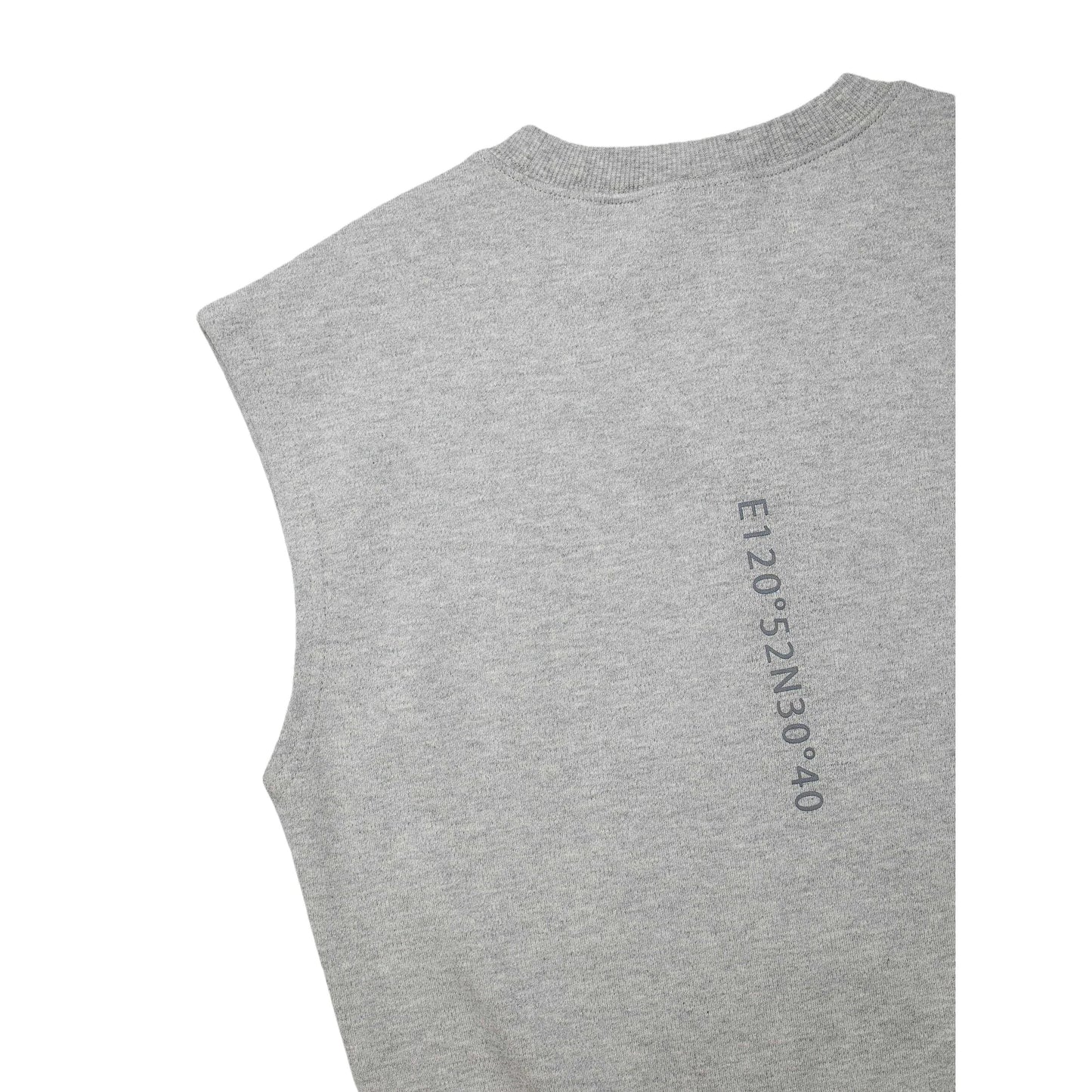 Close-up of the signature vertical typography print on the back of the vest