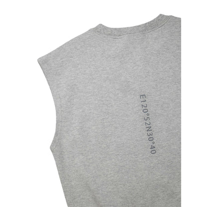 Close-up of the signature vertical typography print on the back of the vest