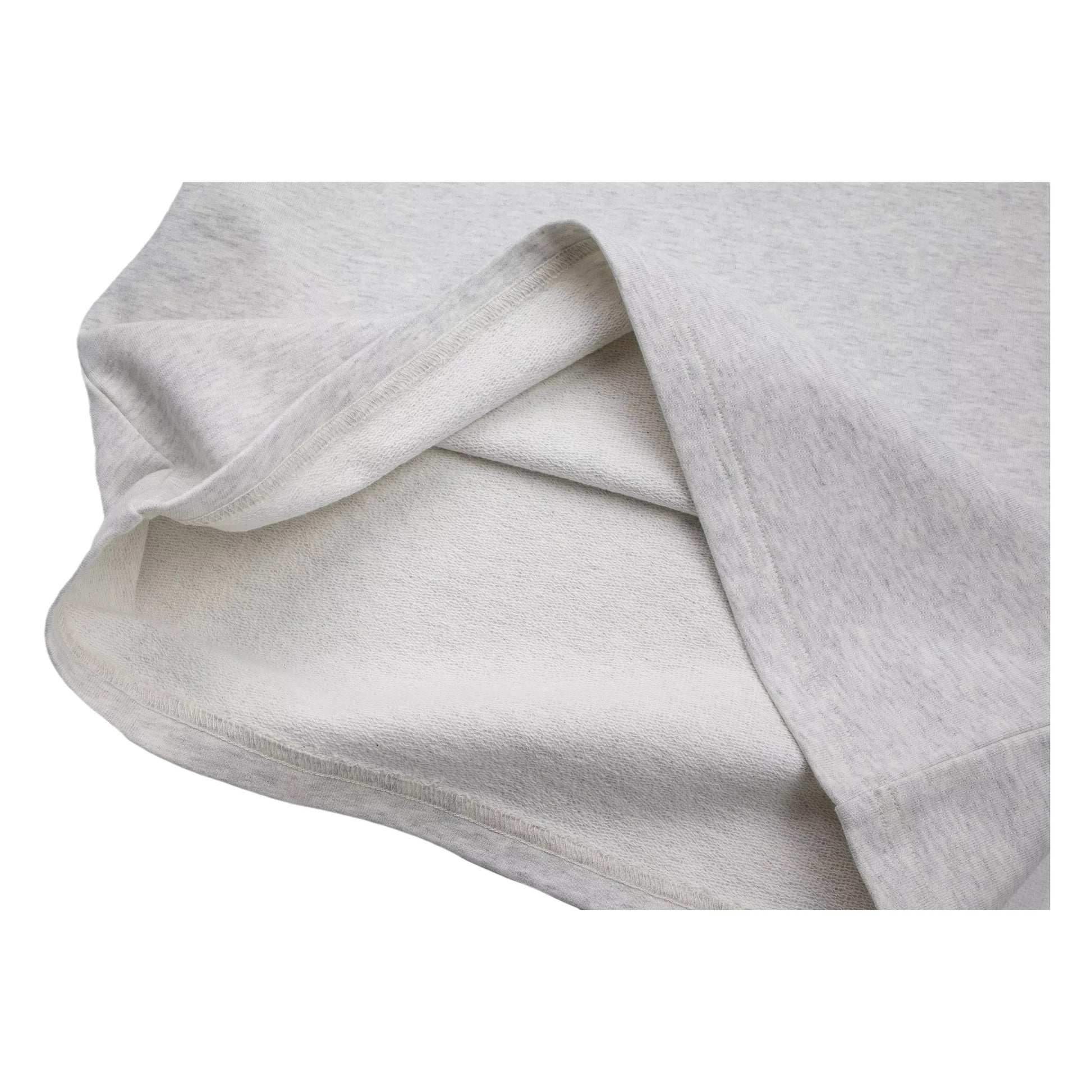 Close-up of the flipped-over hem, highlighting the structured 330 GSM cotton.
