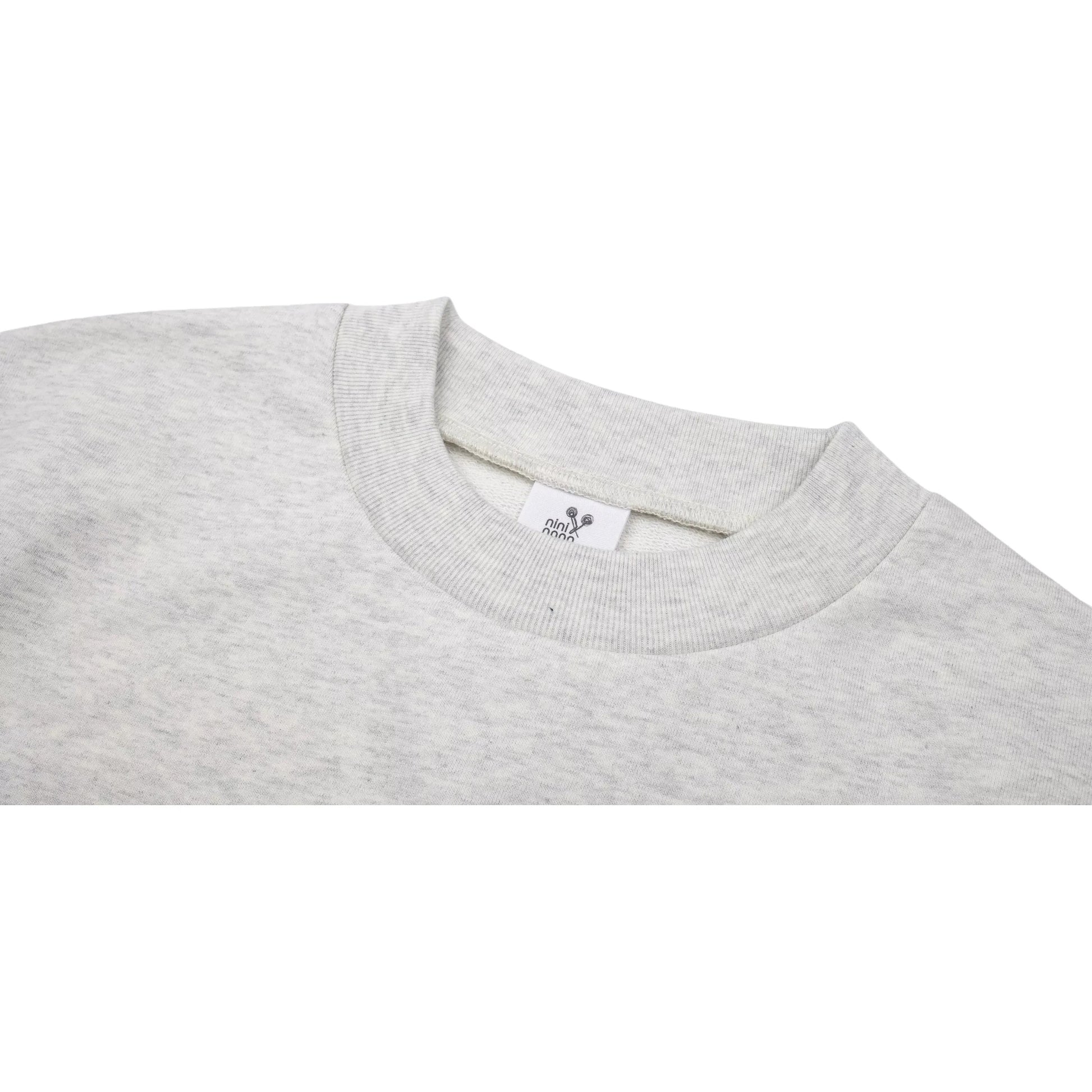 Detailed shot of the durable wide-ribbed crewneck.