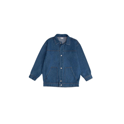 Front view of the unisex oversized washed cotton denim jacket in vintage blue.