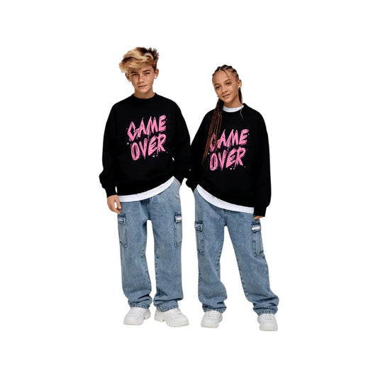 A boy and a girl modeling the unisex black streetwear pullover for a relaxed fit.