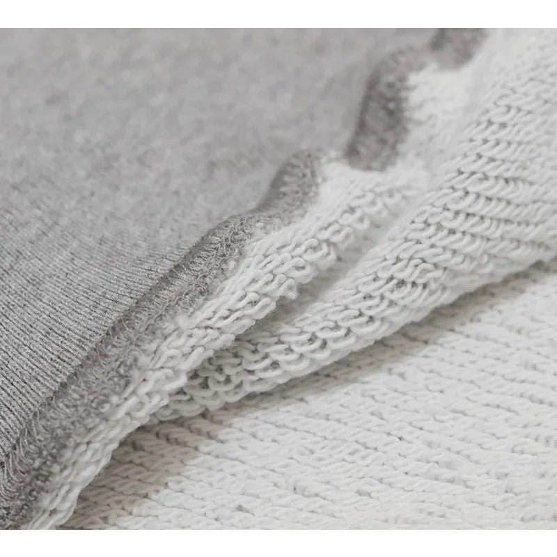 Close-up of the 420 GSM premium cotton fabric texture and soft internal looping.