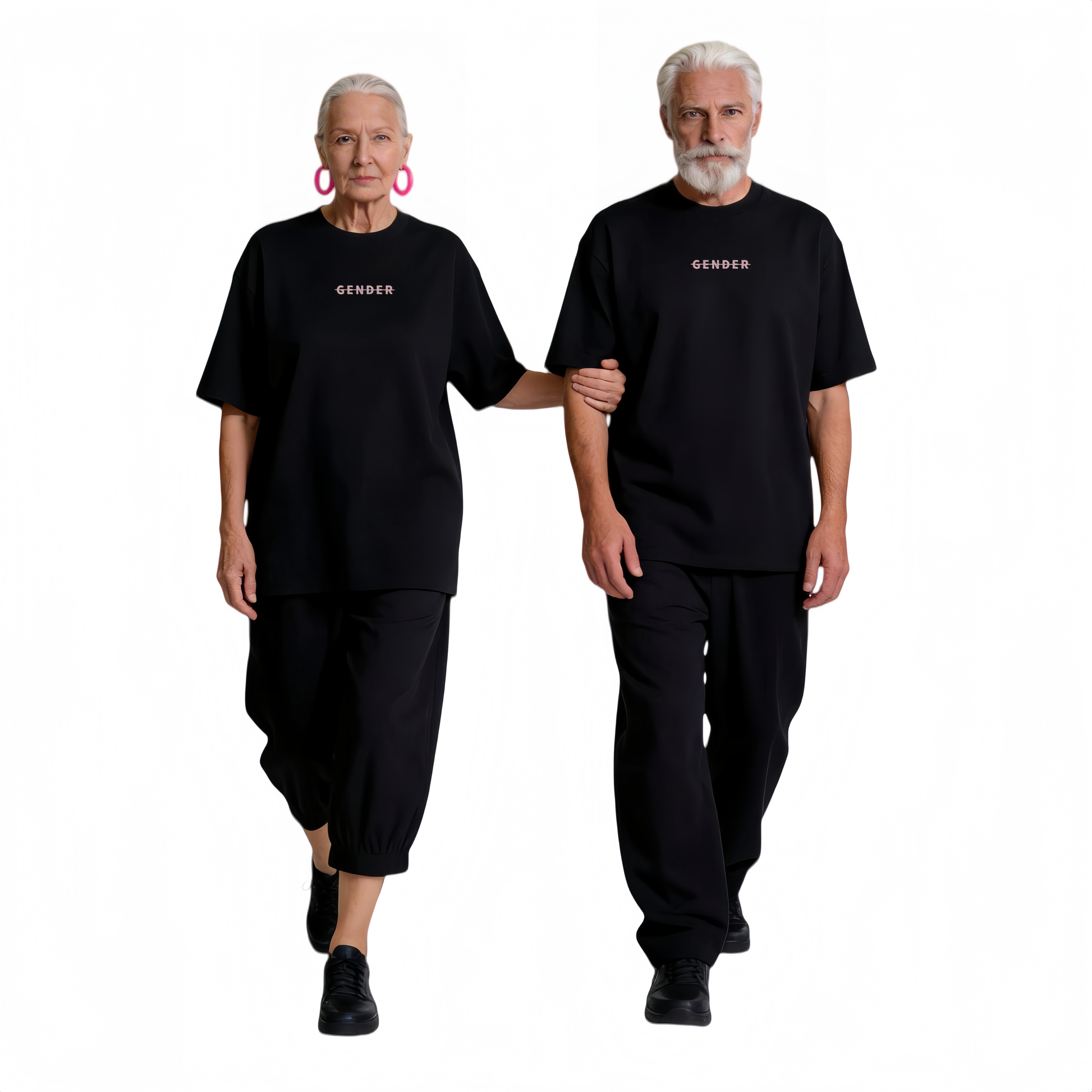 Stylish senior couple walking in coordinated Ogender black oversized tees and matching trousers, embodying the brand's ageless fashion philosophy.